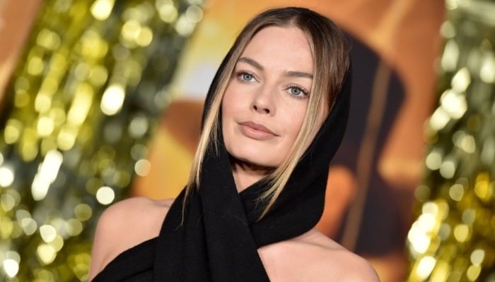 Margot Robbie sparks reaction over Versace silk gown at ‘Babylon’ premiere in Sydney