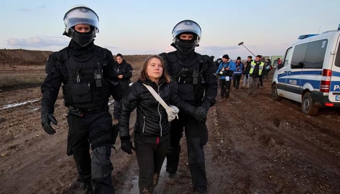 Police officers detain climate activist Greta Thunberg on the day of a protest against the expansion of the Garzweiler open-cast lignite mine of Germanys utility RWE to Luetzerath, in Germany, January 17, 2023. — Reuters