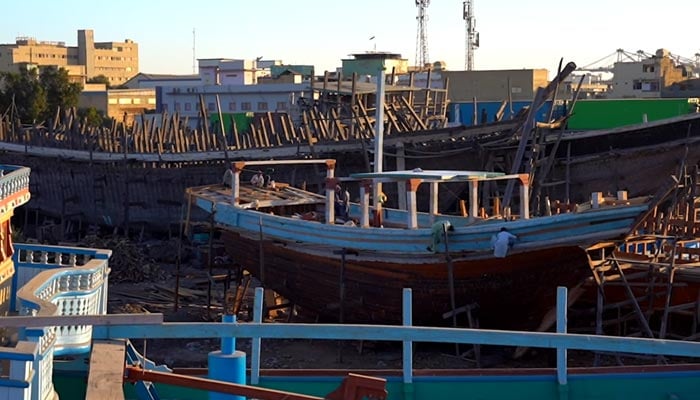 The picture shows boats being built at a boatyard in Karachi. — Facebook screengrab/Geo Digital