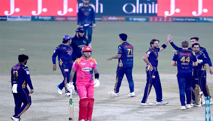 Quetta Gladiators player celebrate the dismissal of Islamabad United’s player during the Pakistan Super League match at the Gaddafi Cricket Stadium. — APP/File