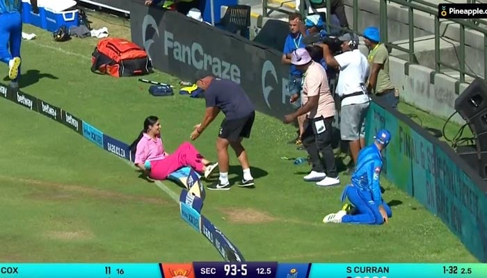 A screengrab of sports presenter Zainab Abbas on the ground while her colleague helps her up. — Twitter/ZAbbasofficial