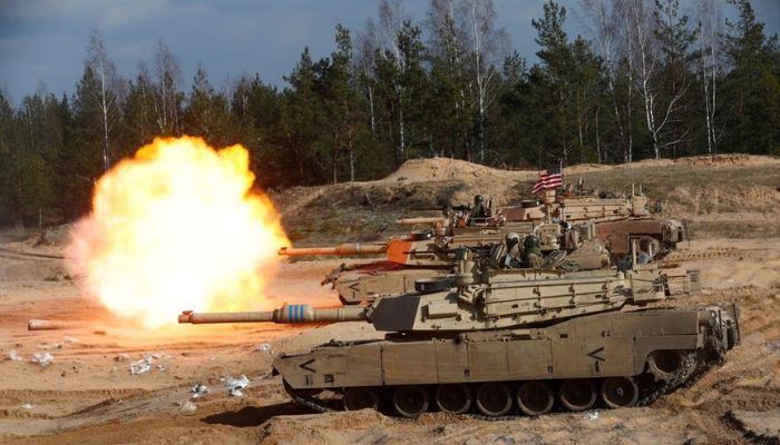 US Army M1A1 Abrams tank fires during NATO enhanced Forward Presence battle group military exercise Crystal Arrow 2021 in Adazi, Latvia March 26, 2021.— Reuters