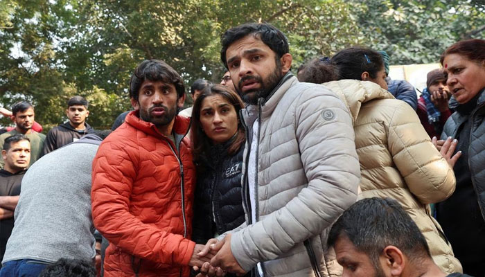 Bajrang Punia, Vinesh Phogat and other Indian wrestlers take part in a protest demanding the disbandment of the WFI and the investigation of its head by the police, who they accuse of sexually harassing female players, at Jantar Mantar in New Delhi, India. January 19, 2023. — Reuters