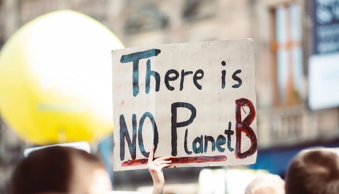 Image shows a placard that reads there is no planet B. Pexels