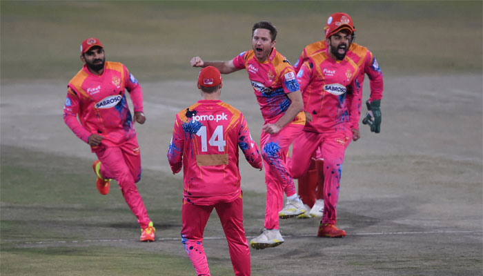 Islamabad Uniteds players celebrate the wicket of Lahore Qalandars Fakhar Zaman (not pictured) during the Pakistan Super League (PSL) Twenty20 eliminator 2 cricket match between Lahore Qalandars and Islamabad United. — AFP/File