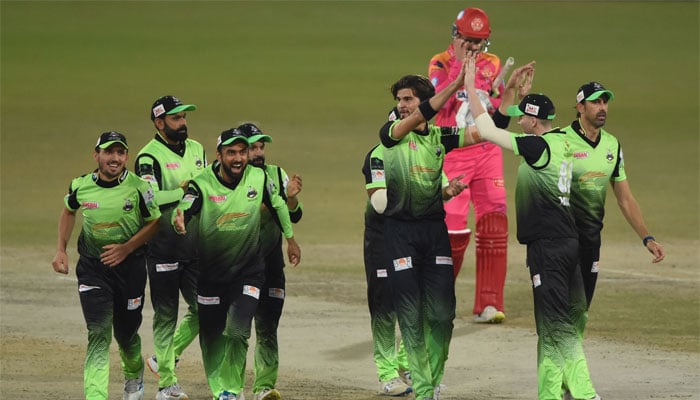 Lahore Qalandars cricketers celebrate the wicket of Islamabad United Will Jacks (3R) during the Pakistan Super League (PSL) Twenty20 eliminator 2 cricket match between Lahore Qalandars and Islamabad United. — AFP/File