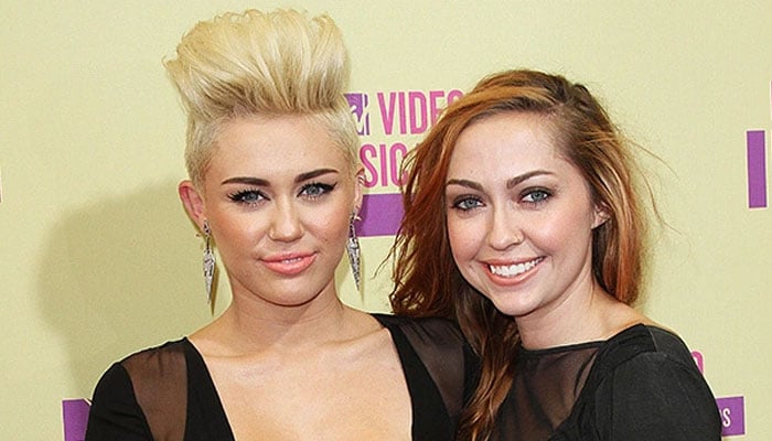 Miley Cyrus’ sis Brandi reacts to theories singers song Flowers Is About Liam Hemsworth