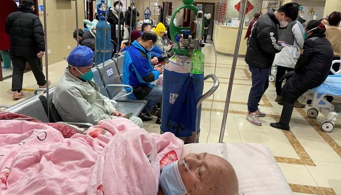 A patient lies on a bed at the emergency department of a hospital, amid the coronavirus disease (COVID-19) outbreak in Shanghai, China January 17, 2023. — Reuters