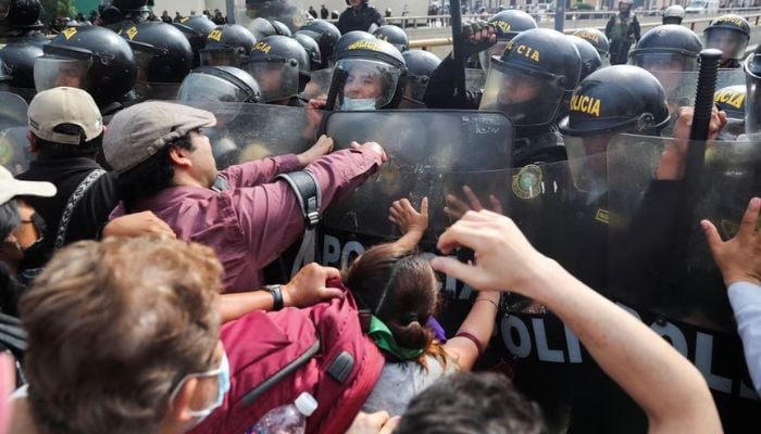 Anti-government protesters clash with the police, as they demand the release of protesters detained in the protests, after President Pedro Castillo was ousted, in Lima, Peru January 21, 2023.— Reuters