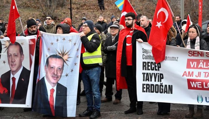 Members of pro-Turkish organisation Union of European Turkish Democrats (UETD) demonstrate in support of Turkiye and President Recep Tayyip Erdogan outside the Turkish embassy in Stockholm, Sweden January 21, 2023.— Reuters
