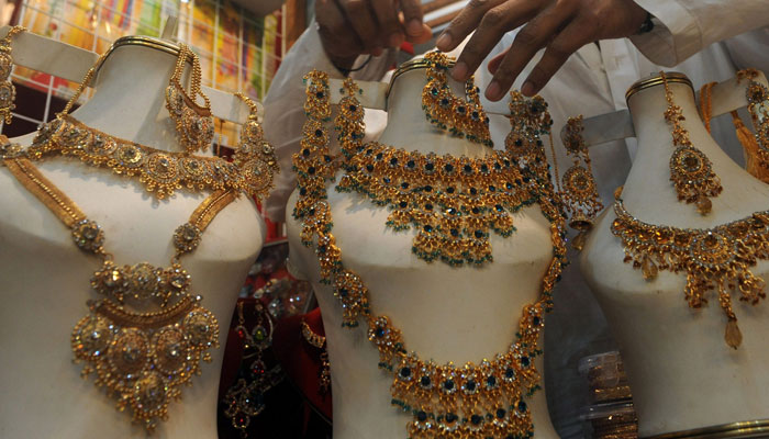 A representational image of gold jewellery displayed in a store. — AFP/File
