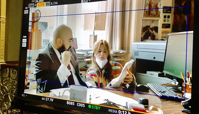 Jemima Goldsmith on a monitor on the sets of Whats Love Gotta Do With It. — Instagram/KhanJemima