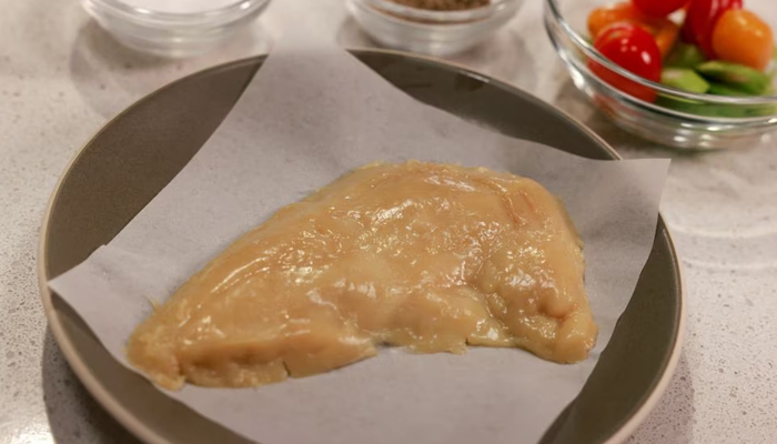 A view shows a raw piece of cultivated chicken breast created at the UPSIDE Foods plant, where lab-grown meat is cultivated, in Emeryville, California, US January 11, 2023.— Reuters