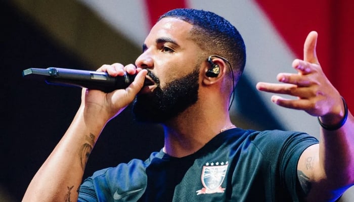 Drake pauses Apollo concert after fan falls from balcony into crowd