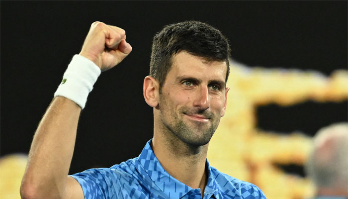 Serbia's Novak Djokovic celebrates after victory against Australia's Alex De Minaur during their men's singles match on day 8 of Australian Open tennis tournament in Melbourne on January 23, 2023. — AFP