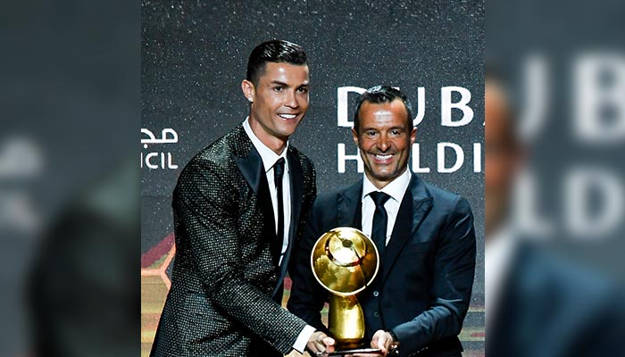 Cristiano Ronaldo (left) photographed with former agent Jorge Mendes during the Globe Soccer Awards. — Globesoccer.com
