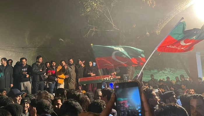 PTI supporters gathered outside Imran Khan's residence in Lahore's Zaman Park in the early hours of Wednesday.  Twitter