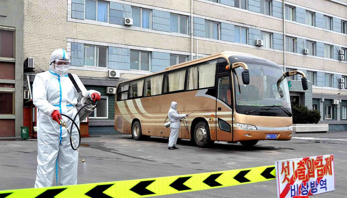 Volunteers carry out disinfection work during an anti-virus campaign in Pyongyang, North Korea. — Reuters/File