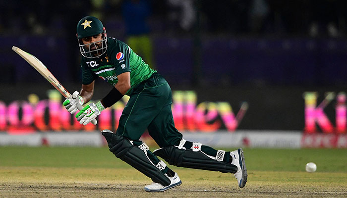 Pakistan´s captain Babar Azam plays a shot during the second one-day international (ODI) cricket match between Pakistan and New Zealand at the National Stadium in Karachi on January 11, 2023.