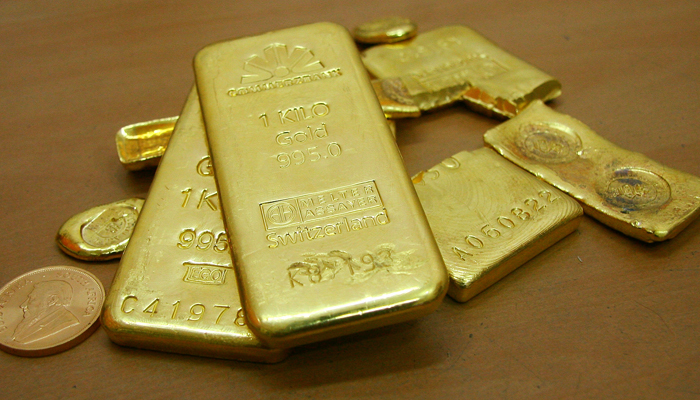 Gold bars are displayed at a gold jewellery shop in the northern Indian city of Chandigarh on November 4, 2009. — Reuters/File