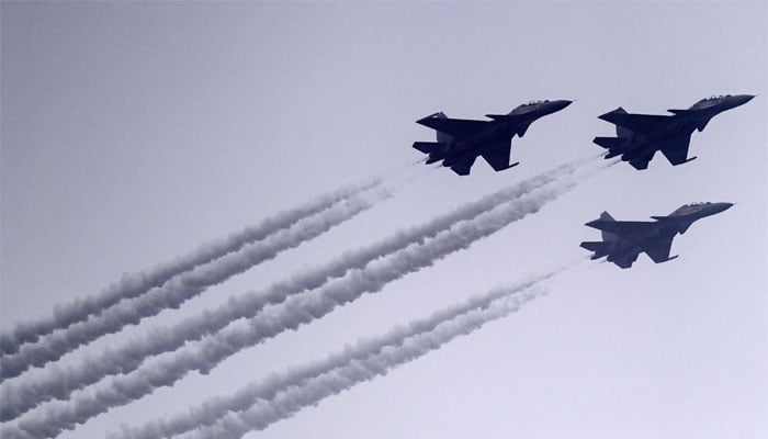 Indian fighter jets fly past during the Indian 74th Republic Day parade in New Delhi on January 26, 2023. — AFP