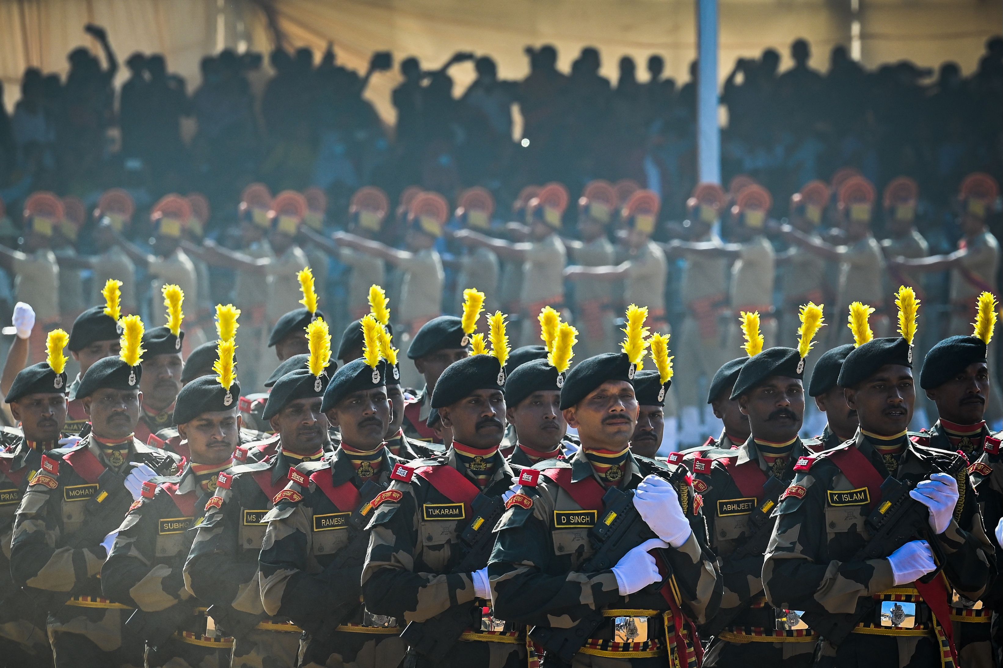 Personnel of the Border Security Force (BSF) march during the parade. — AFP