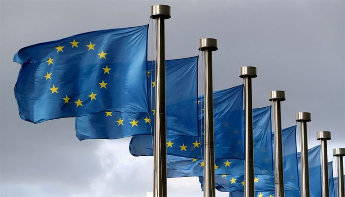 EU flags flutter in front of the European Commission headquarters in Brussels, Belgium. — Reuters/File