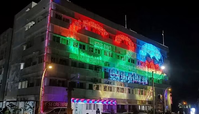 A government building illuminates with the G20 logo in an Indian city. — ANI/File