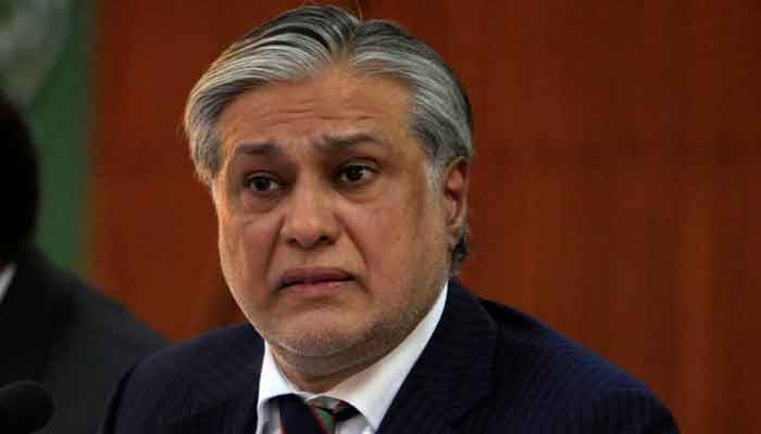 Finance Minister Ishaq Dar speaks to the reporters in this undated picture.  Reuters/File