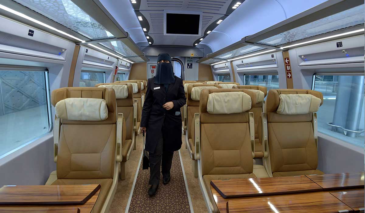 Saudi conductor Tharaa Ali is pictured in one of the wagons of the high-speed. — AFP