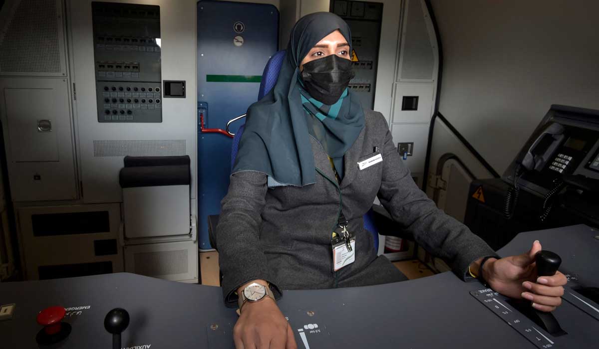 Saudi conductor Raneem Azzouz drives a high-speed train ferrying pilgrims to Makkah, in Saudi Arabias Red Sea coastal city of Jeddah. — AFP