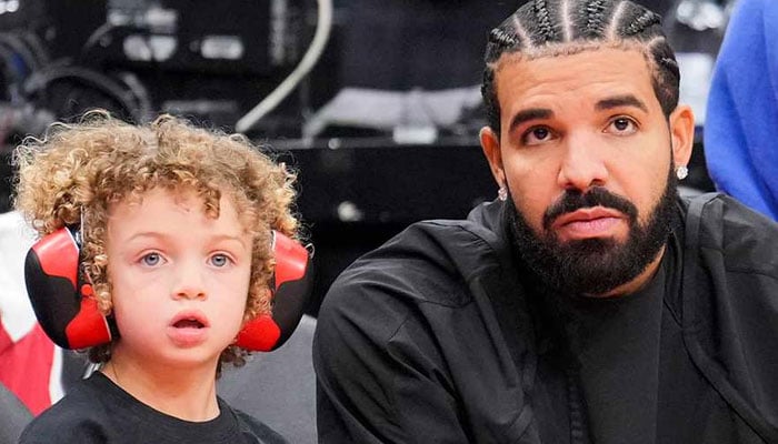 Drake and his son Adonis pose in matching outfits at mum’s birthday party
