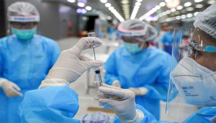 A medical worker prepares a syringe with a dose of Chinas Sinovac coronavirus disease (COVID-19) vaccine at the Central Vaccination Center, inside the Bang Sue Grand Station, in Bangkok, Thailand. — Reuters/File