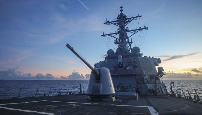 A photograph of guided-missile destroyer USS Benfold (DDG 65), forward-deployed to the US 7th Fleet area of operations, conducting underway operations in the South China Sea. Reuters/File