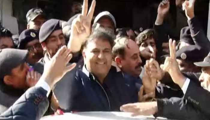 PTI leader Fawad Chaudhry leaves the court after his bail petition was approved on February 1, 2023. — Geo News screengrab
