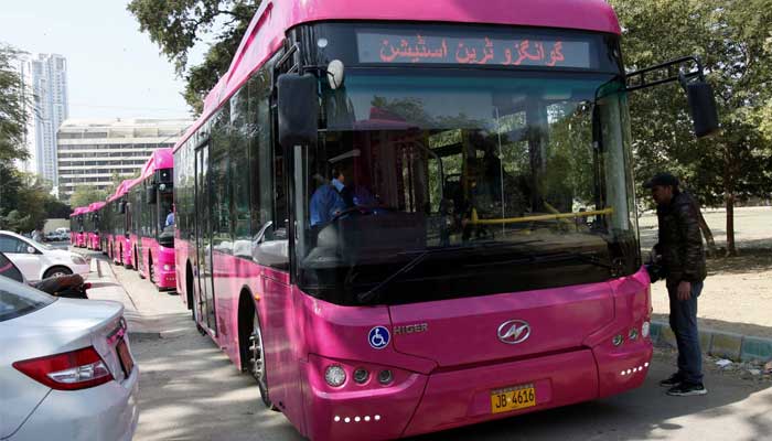 View of Pink Peoples Bus Service project buses on its way to start the operation of buses after inauguration ceremony in Karachi on February 1, 2023. — PPI