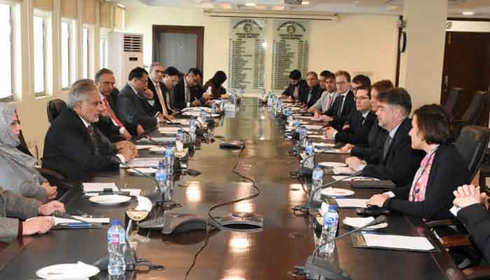 Finance Minister Senator Mohammad Ishaq Dar in a meeting with the IMF mission led by Mission Chief Nathan Porter at Finance Division. — Ministry of Finance