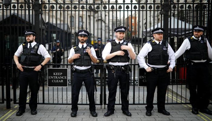 Police officers stand guard outside Downing Street in London, Britain. Reuters/File