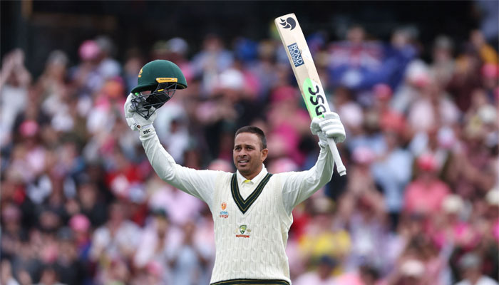 Australias Usman Khawaja celebrates reaching his century (100 runs) during day two of the third cricket Test match between Australia and South Africa at the Sydney Cricket Ground. — AFP/File