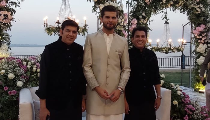 Shaheen Shah Afridi (centre) poses with Lahore Qalandars Sameen Rana (left) and Atif Rana during the Nikah reception in Karachi, on February 3, 2023. — Photo by author