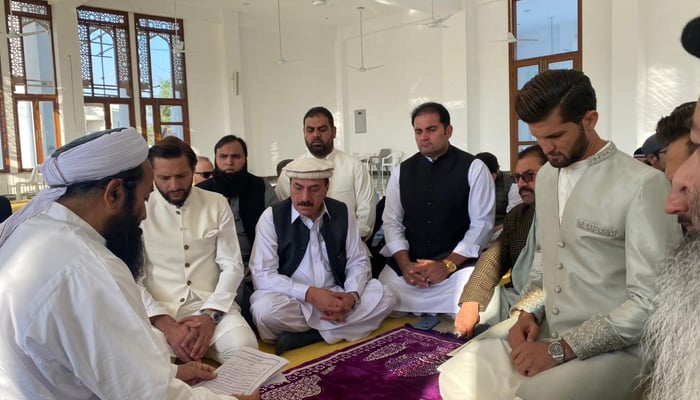 Pakistan pace ace Shaheen Shah Afridi (right) gestures during the Nikah ceremony at a mosque in Karachi, on February 3, 2023. — Photo by author