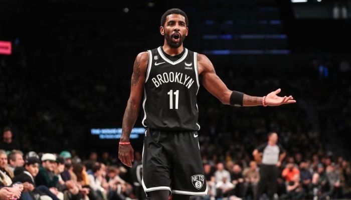 Dec 4, 2022; Brooklyn, New York, USA; Brooklyn Nets guard Kyrie Irving (11) argues with an official in the fourth quarter against the Boston Celtics at Barclays Centre.— Reuters