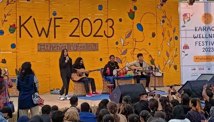 An attendee singing at the live show at the Karachi Wellness Festival held at Veritas Learning Circle in PECHS on February 04, 2023. — Provided by the author