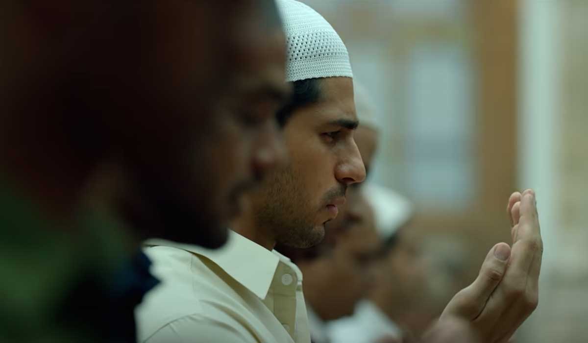 A scene in the movie showing the lead character offering prayers. — Screengrab via YouTube/Netflix India