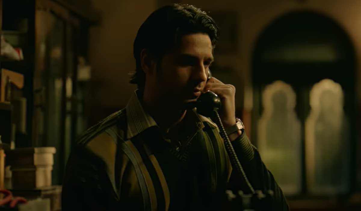 In this scene the lead character speaks on a classified call. — Screengrab via YouTube/Netflix India