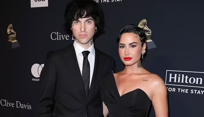 Demi Lovato, Jordan Lutes make PDA-filled red carpet debut at pre-Grammy gala