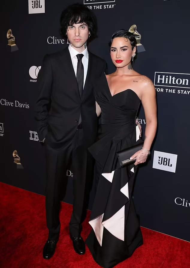Demi Lovato, Jordan Lutes make PDA-filled red carpet debut at pre-Grammy gala