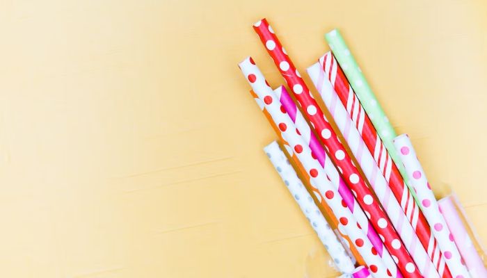 Image shows colourful paper straws.— Unsplash
