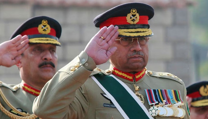 Former president General (retd) Pervez Musharraf photographed during the playing of Pakistans national anthem at the Joint Staff Headquarters in Rawalpindi on November 27, 2007. — Reuters