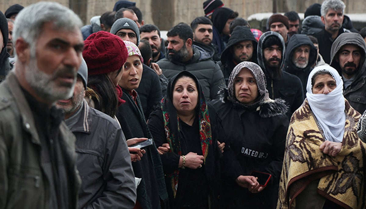 People wait as rescue operations take place on a site after an earthquake in Diyarbakir, Turkey February 6, 2023. — Reuters